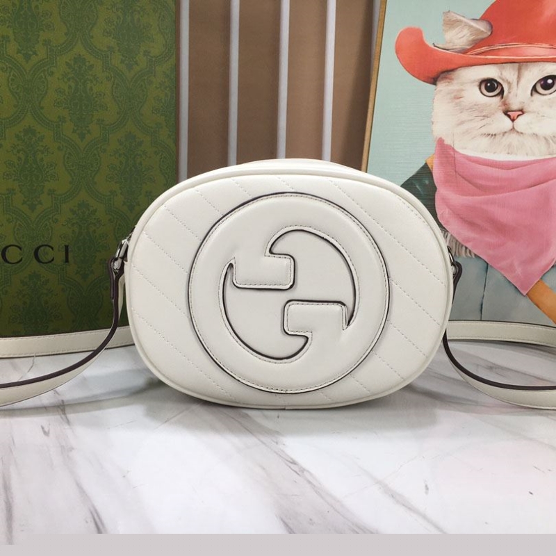 G*u*i satchel bags